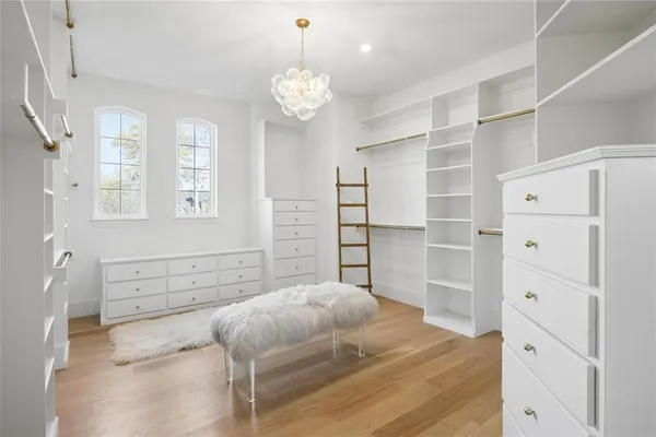 a room with a cabinets and a sink