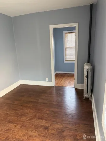 a view of livingroom with furniture and wooden floor