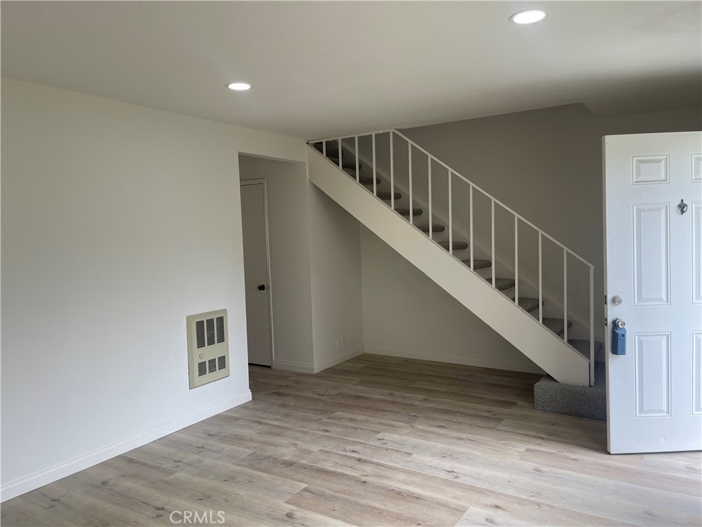 16 Gatewood Irvine, CA 92604 - Photo 2 of 12 a view of entryway and hall with wooden floor