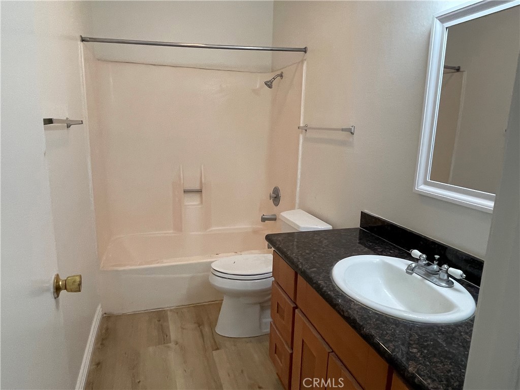16 Gatewood Irvine, CA 92604 - Photo 10 of 12 a bathroom with a sink a toilet and shower