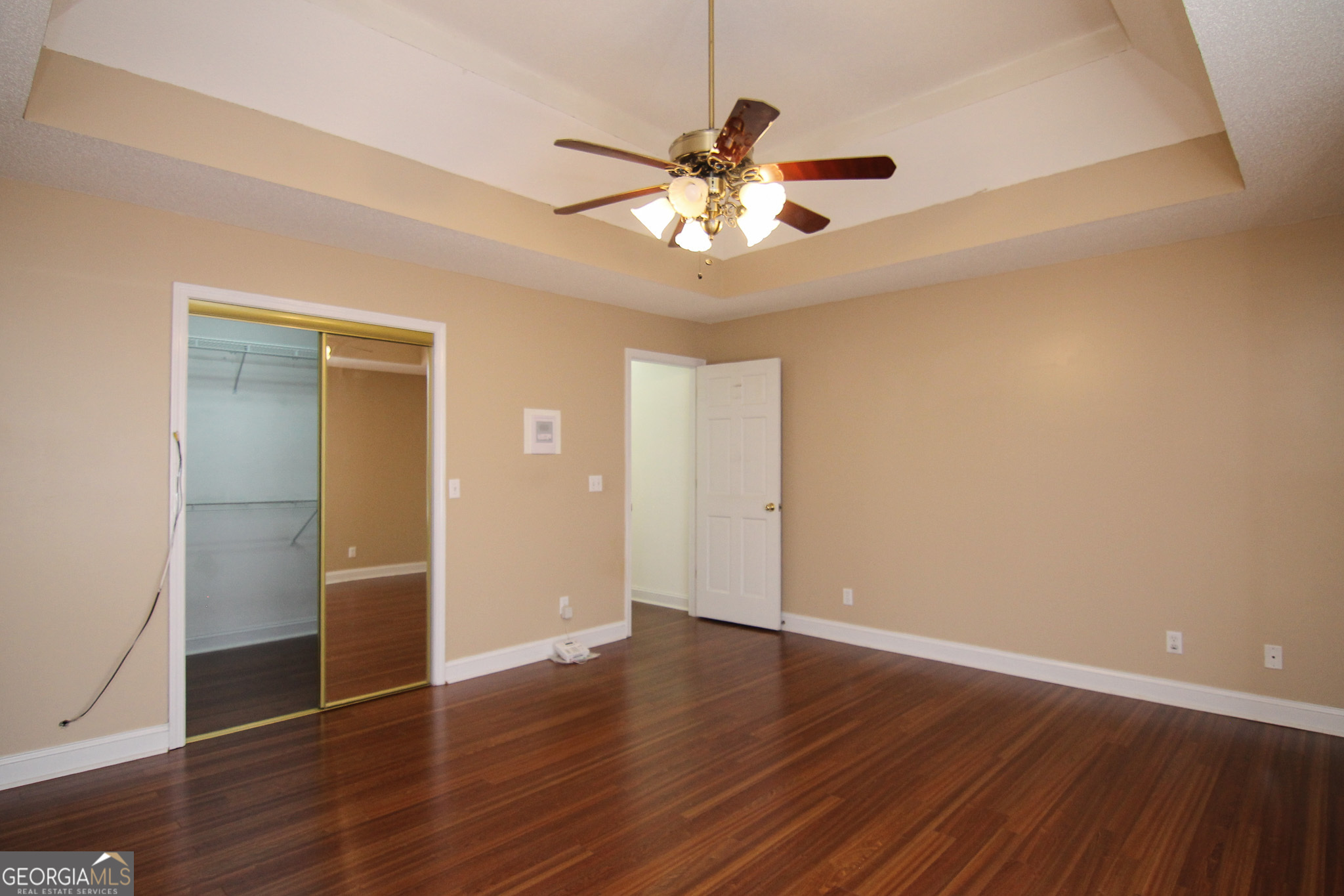 111 Maple Glen Centerville, GA 31028 - Photo 16 of 35 a view of an empty room with wooden floor