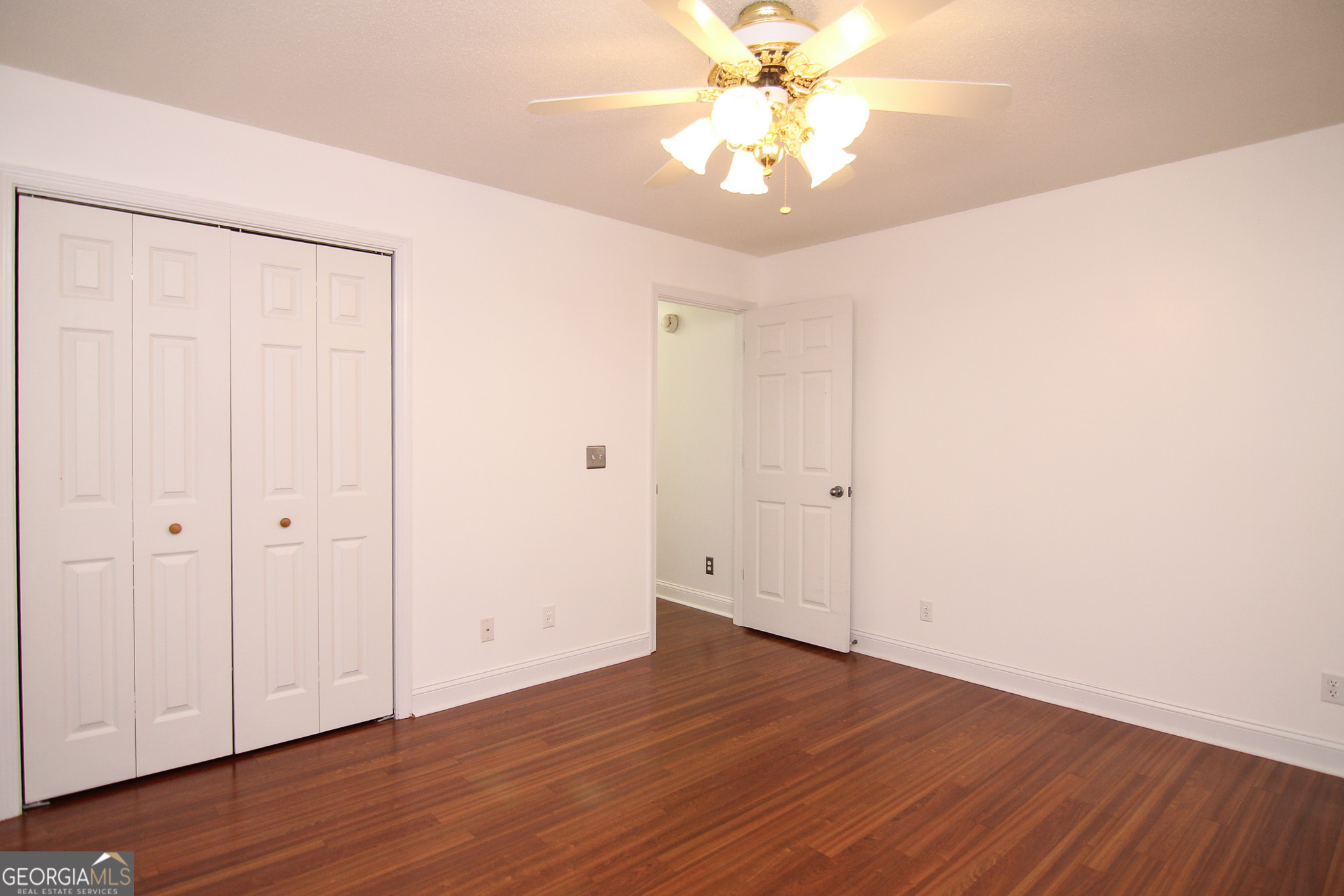 111 Maple Glen Centerville, GA 31028 - Photo 24 of 35 a view of an empty room with wooden floor