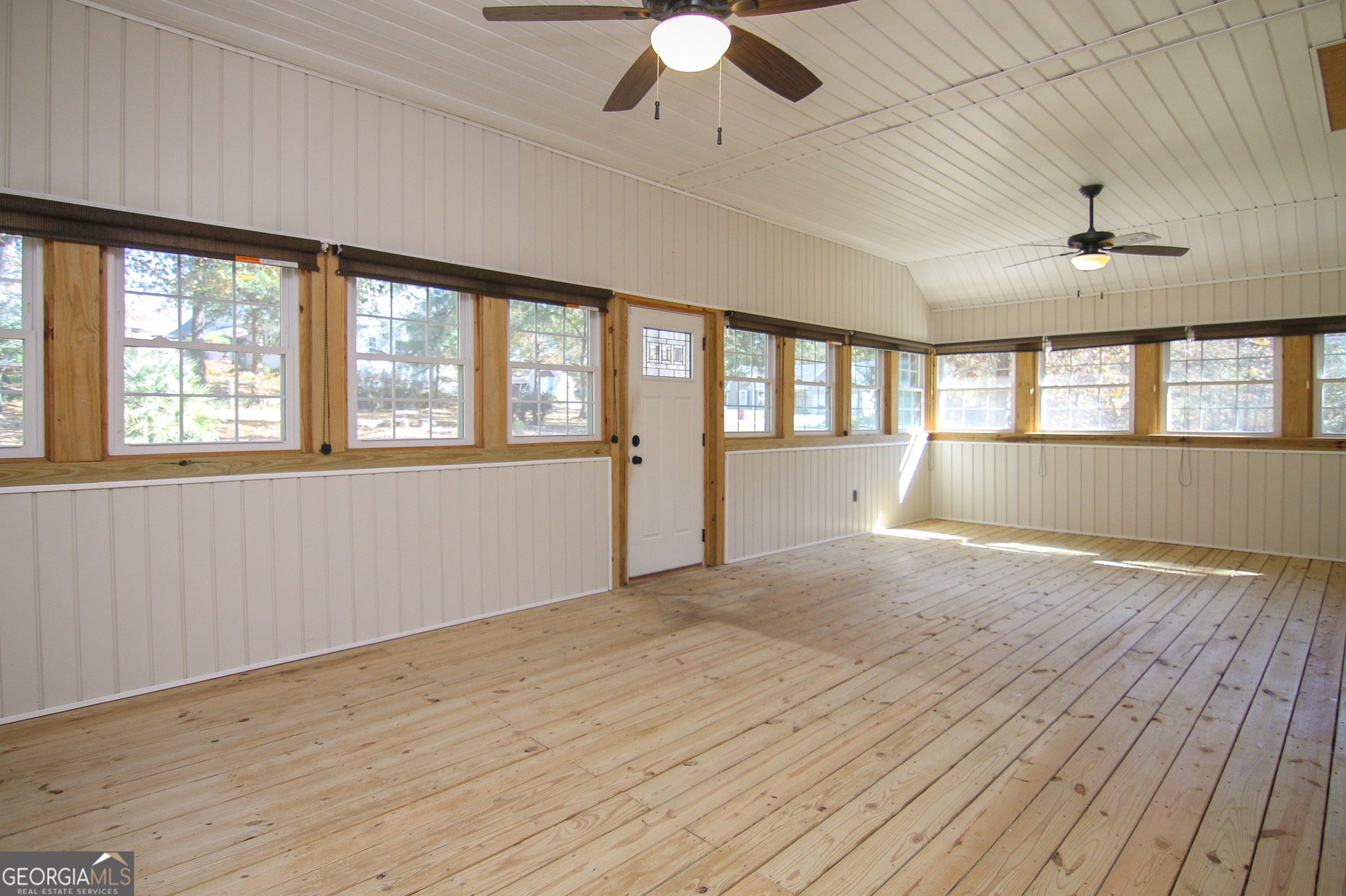 111 Maple Glen Centerville, GA 31028 - Photo 30 of 35 a view of an empty room with a window and wooden floor