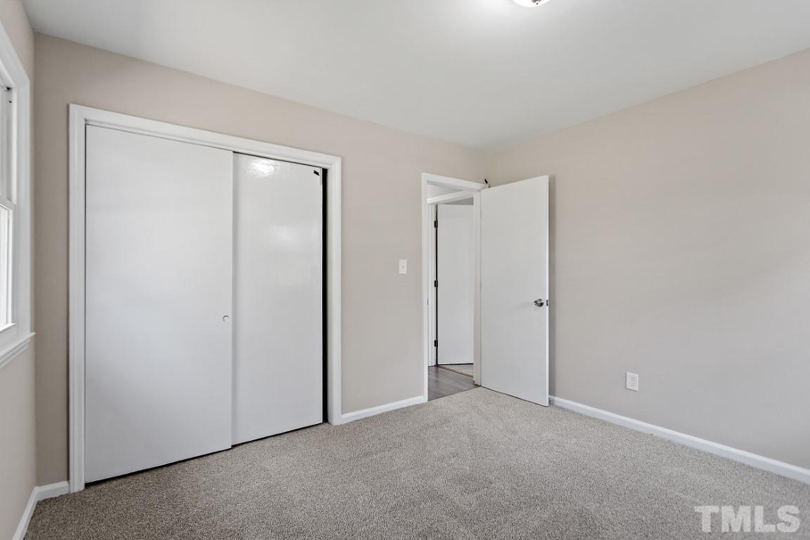 4116 Kilcullen Drive Raleigh, NC 27604 - Photo 18 of 28 a view of an empty room