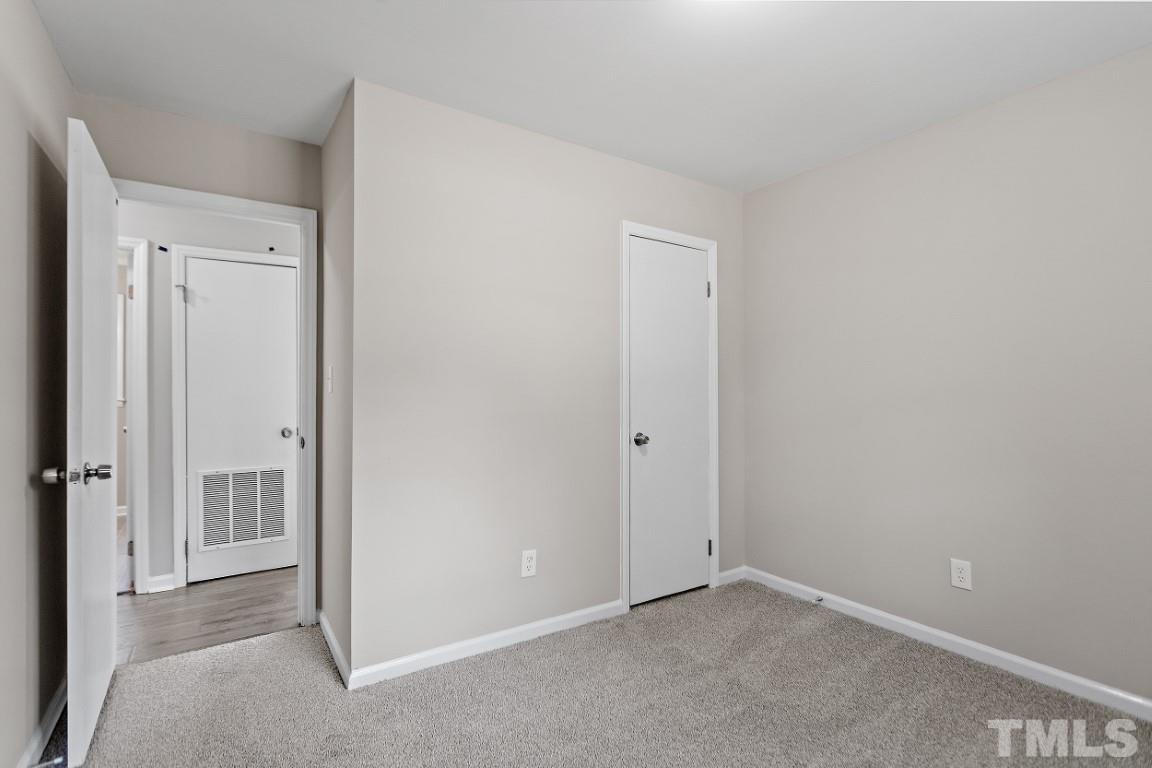 4116 Kilcullen Drive Raleigh, NC 27604 - Photo 22 of 28 a view of an empty room