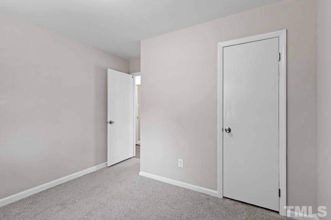 4116 Kilcullen Drive Raleigh, NC 27604 - Photo 23 of 28 a view of an empty room