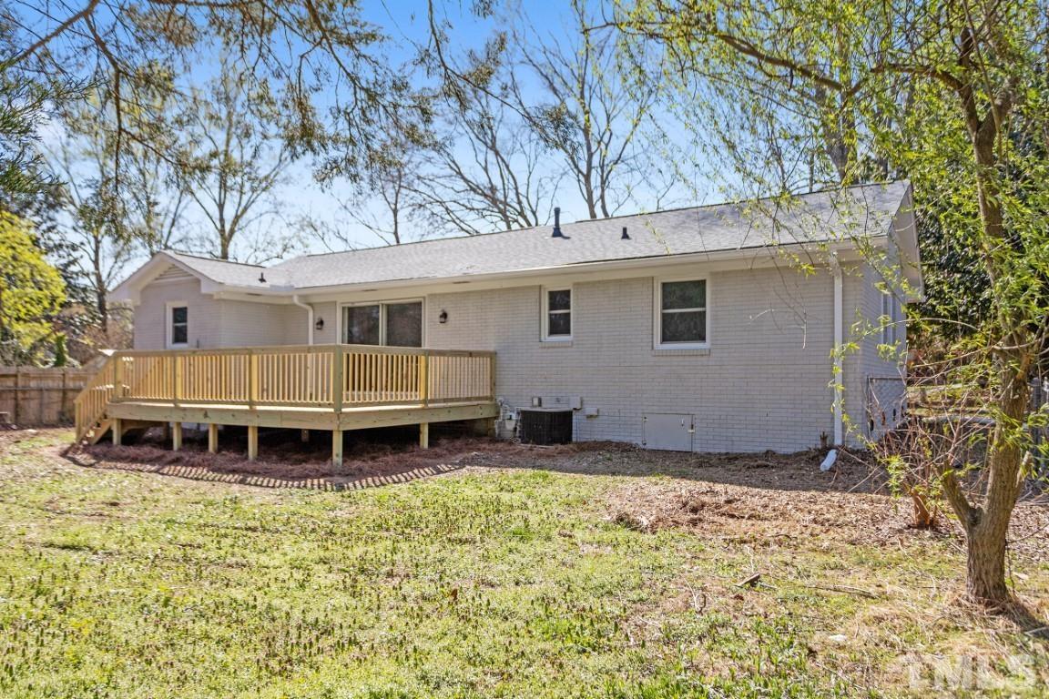 4116 Kilcullen Drive Raleigh, NC 27604 - Photo 25 of 28 a view of a house with a yard