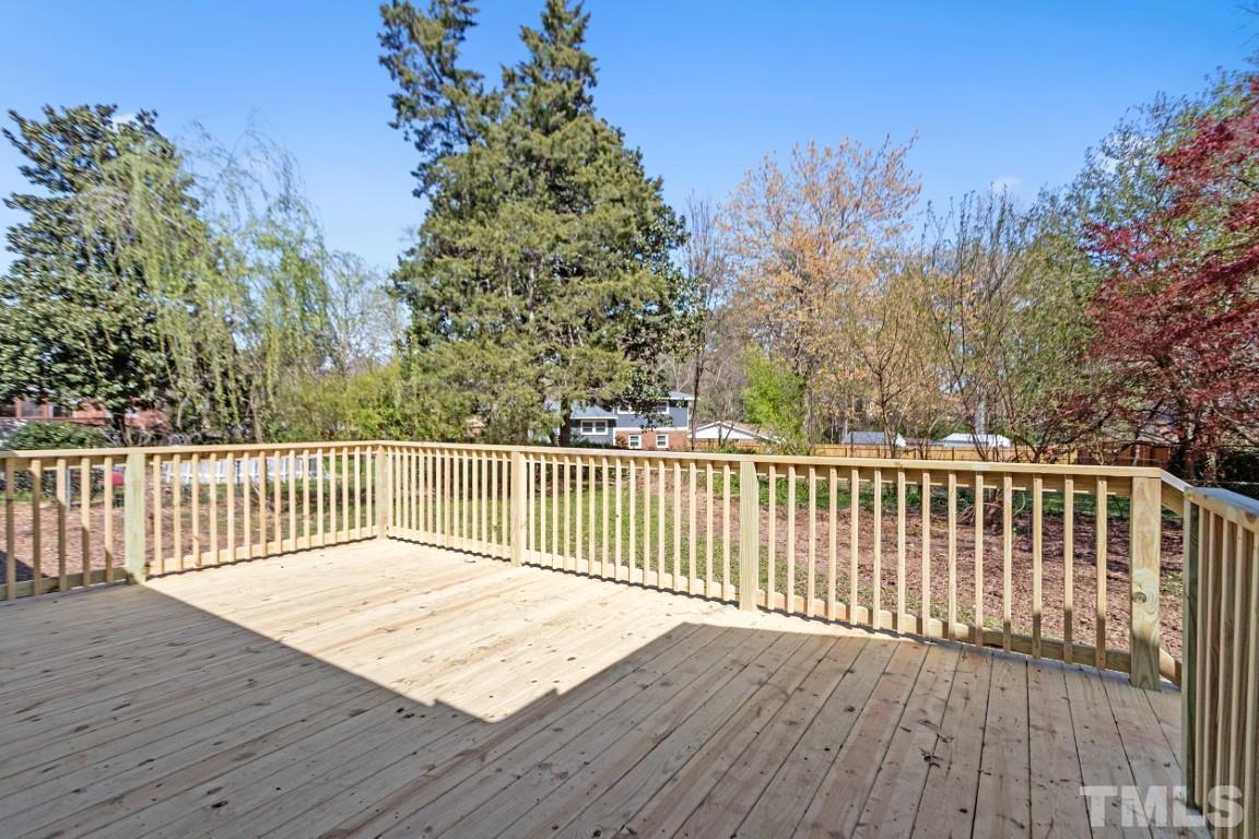 4116 Kilcullen Drive Raleigh, NC 27604 - Photo 27 of 28 a view of a wooden roof deck