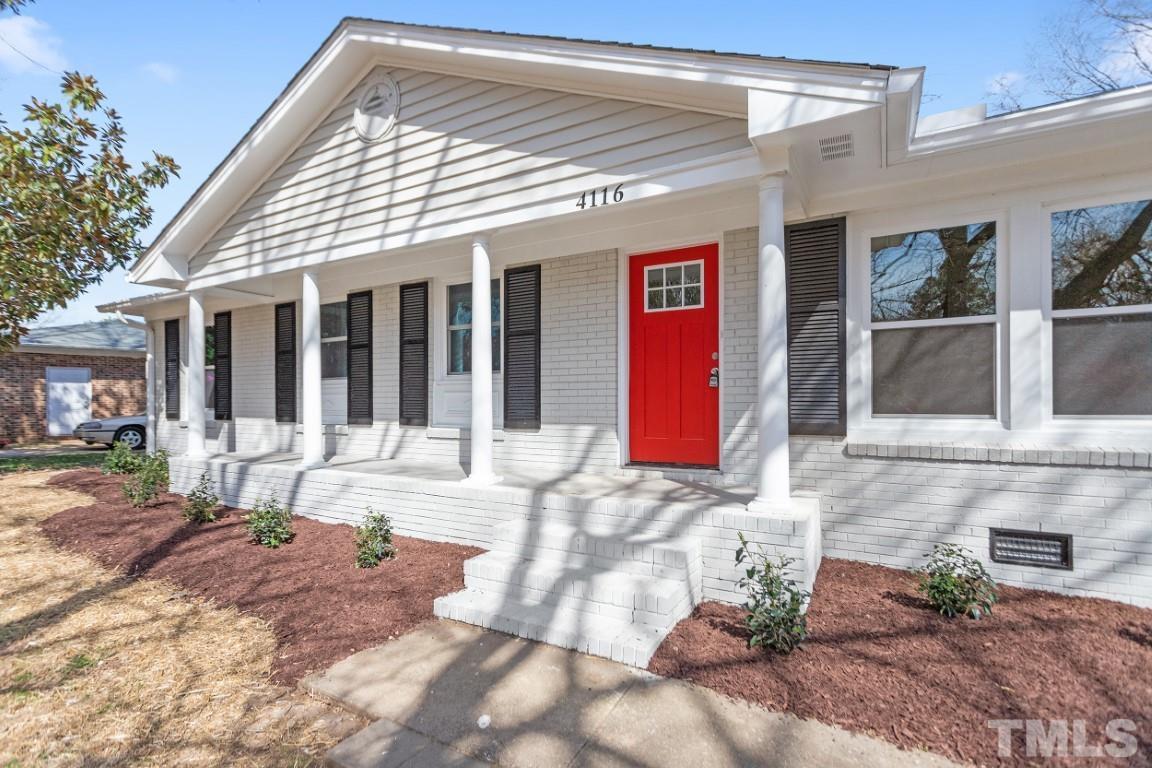 4116 Kilcullen Drive Raleigh, NC 27604 - Photo 28 of 28 a front view of a house with a patio