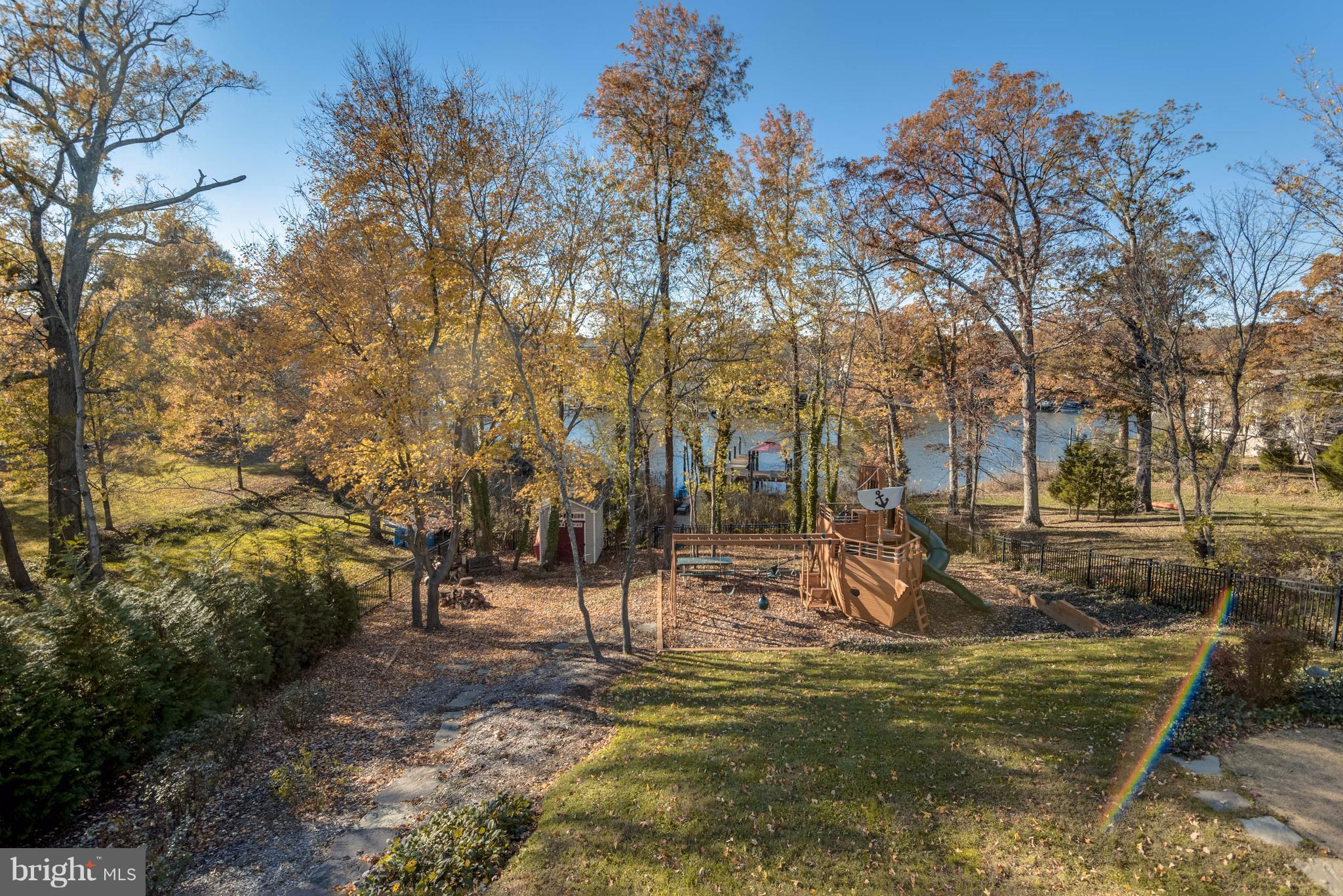 7740 West Shore Road Pasadena, MD 21122 - Photo 2 of 30 Professionally Landscaped Fenced Backyard
