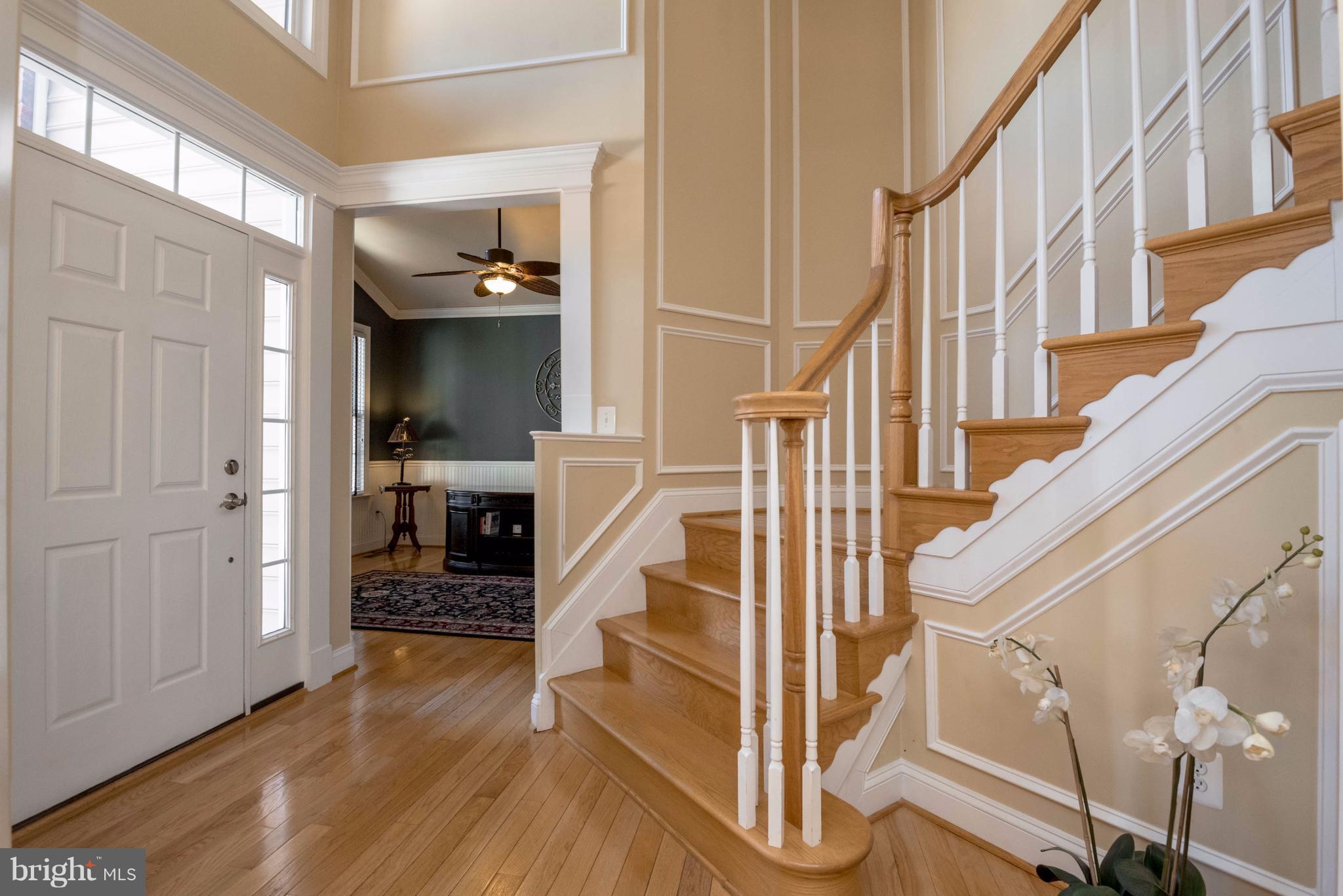 7740 West Shore Road Pasadena, MD 21122 - Photo 8 of 30 Gleaming wood floors and Stairs
