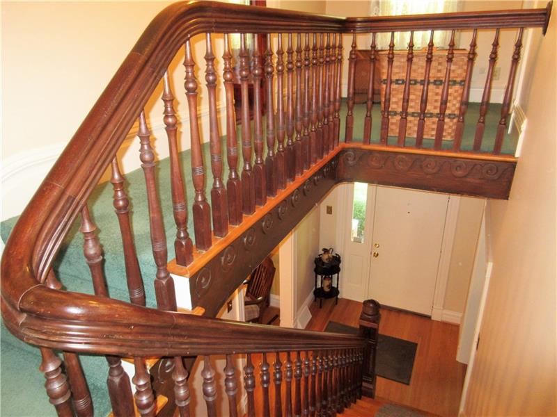 230 Compton Road Sewickley, PA 15143 - Photo 14 of 24 The front hallway post and handrail are made of black walnut and are original to the house.