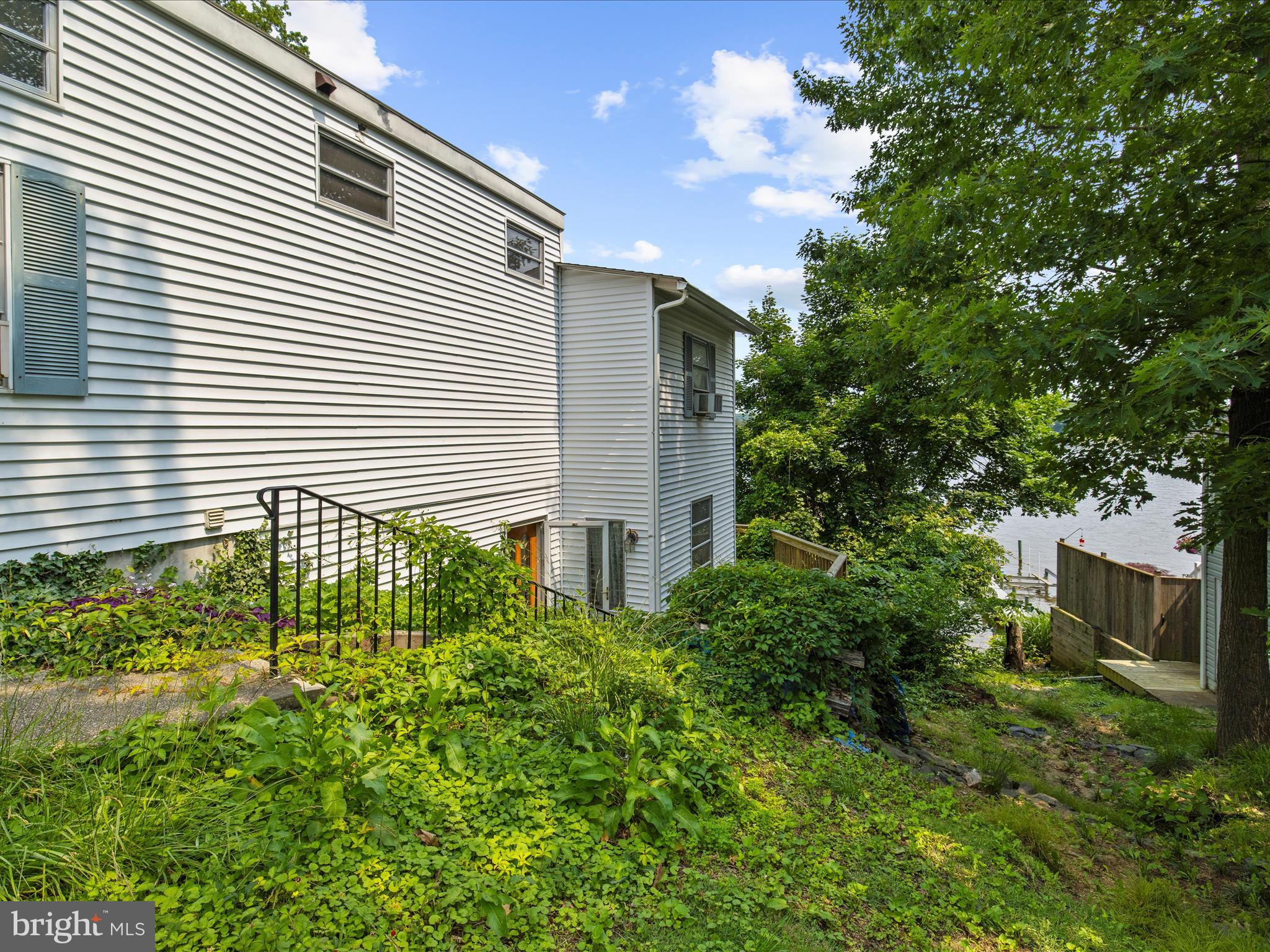 8 Shorewalk Road Riva, MD 21140 - Photo 3 of 20 a view of a house with a yard and sitting area