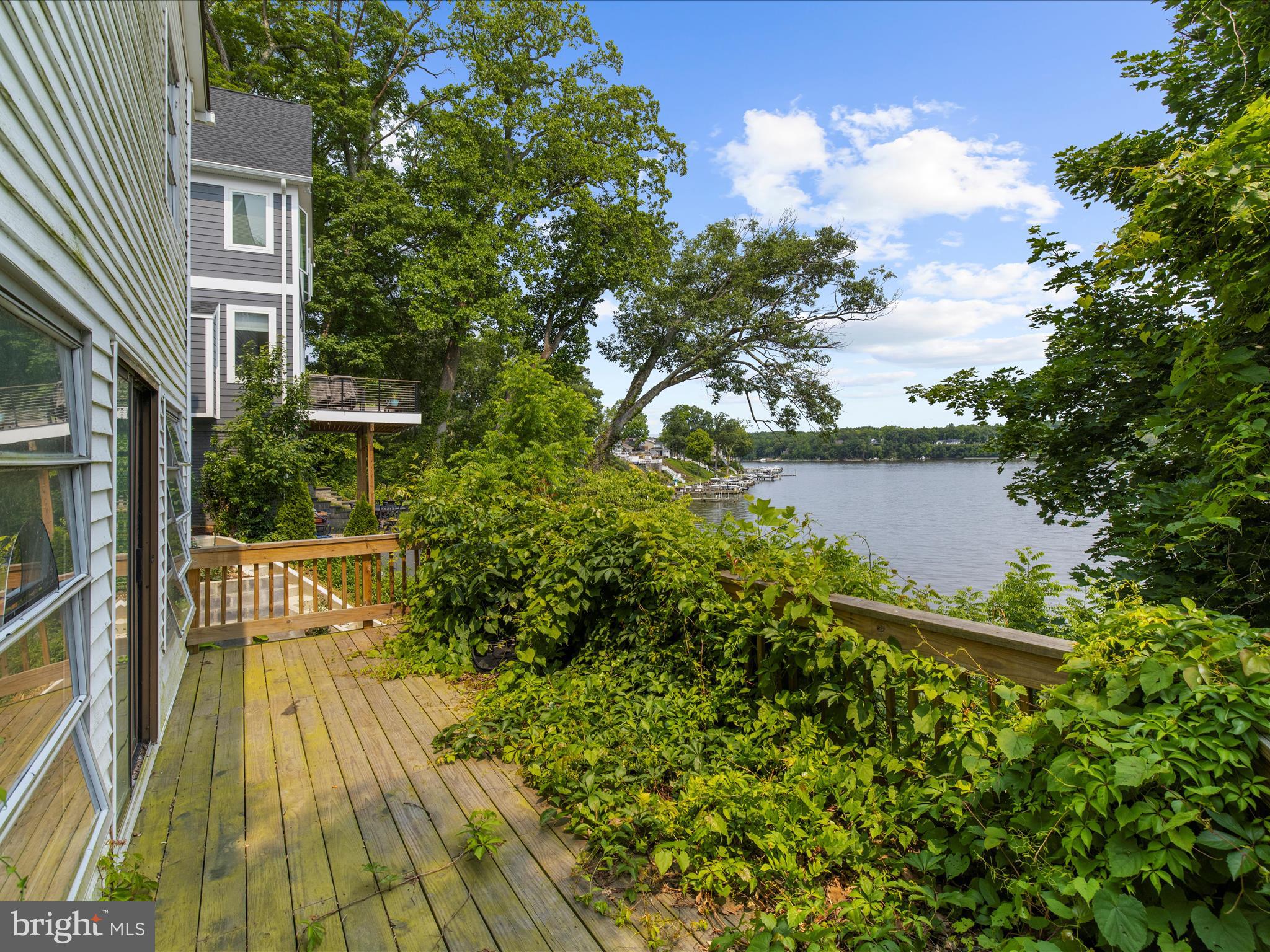 8 Shorewalk Road Riva, MD 21140 - Photo 4 of 20 a view of a houses with a lake