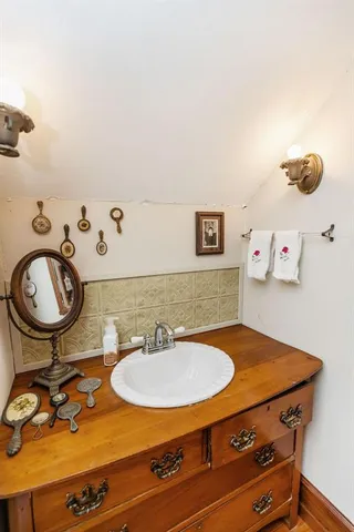 a kitchen with stainless steel appliances granite countertop a stove and a refrigerator