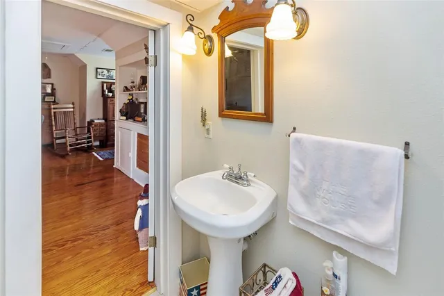 a bathroom with a tub and a window