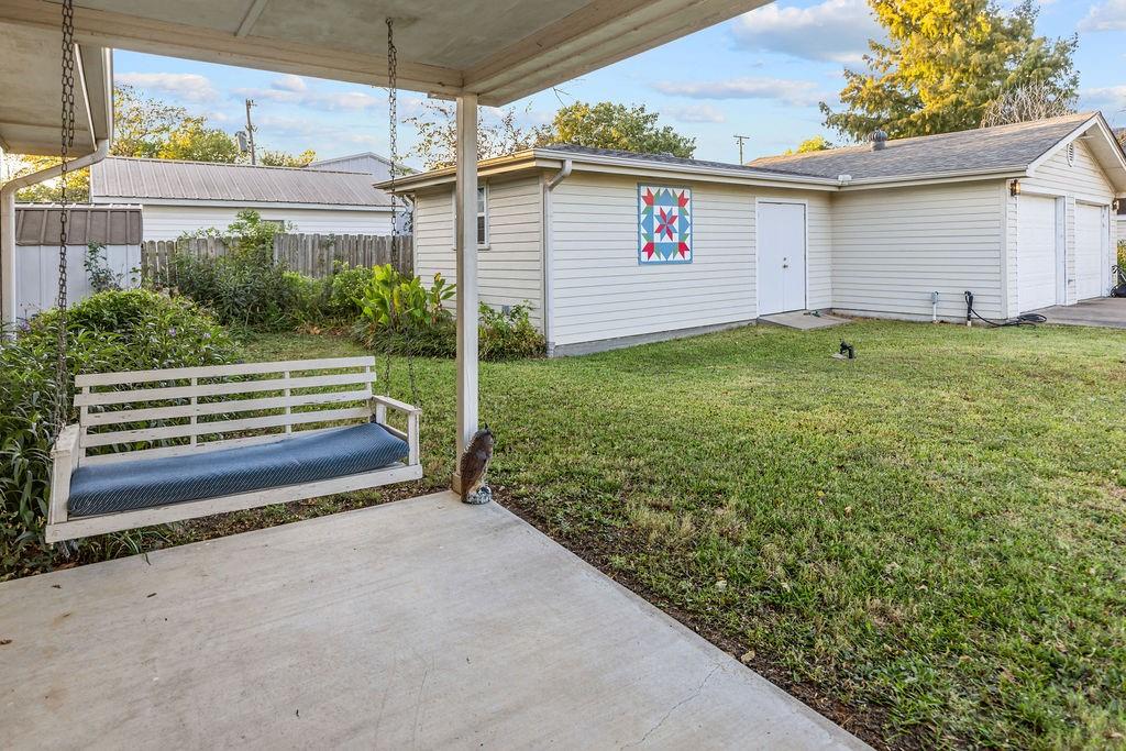 704 East Main Street Honey Grove, TX 75446 - Photo 33 of 38 a view of a backyard
