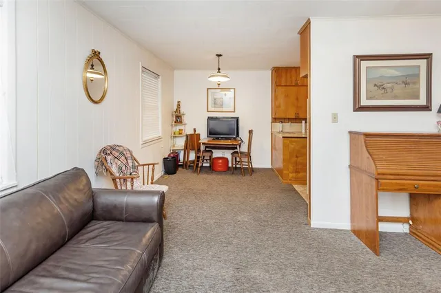 a bedroom with a bed and a cabinets