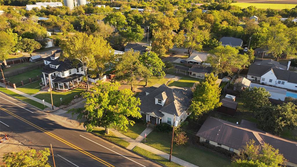 704 East Main Street Honey Grove, TX 75446 - Photo 38 of 38 an aerial view of residential houses with outdoor space