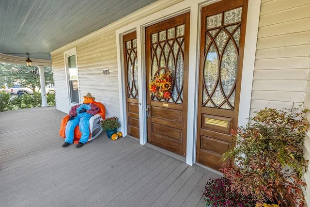 a view of a room with porch and outdoor seating