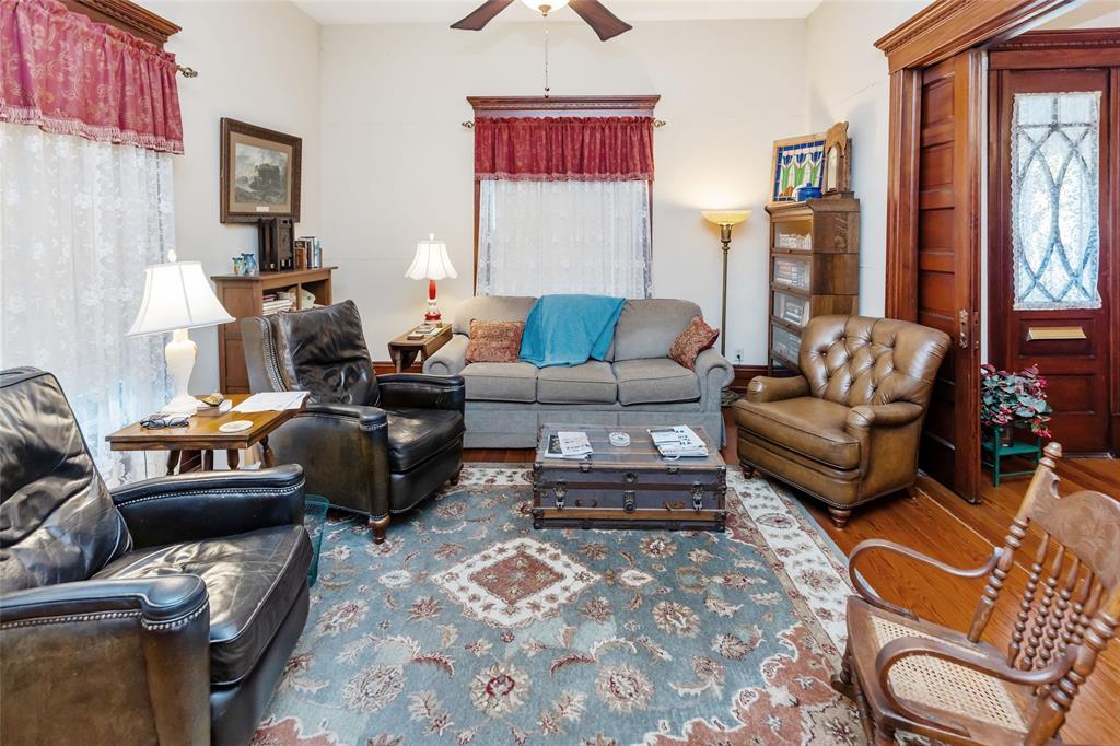 704 East Main Street Honey Grove, TX 75446 - Photo 7 of 38 a living room with furniture or couch and a window