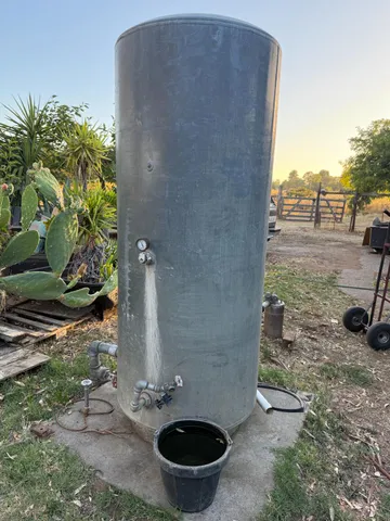 a front view of house with yard and trees