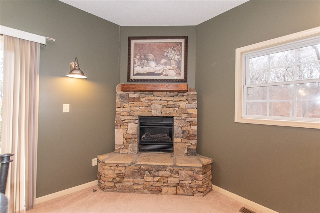 142 Fowler Road Anderson, SC 29625 - Photo 8 of 38 Gas log fireplace in kitchen