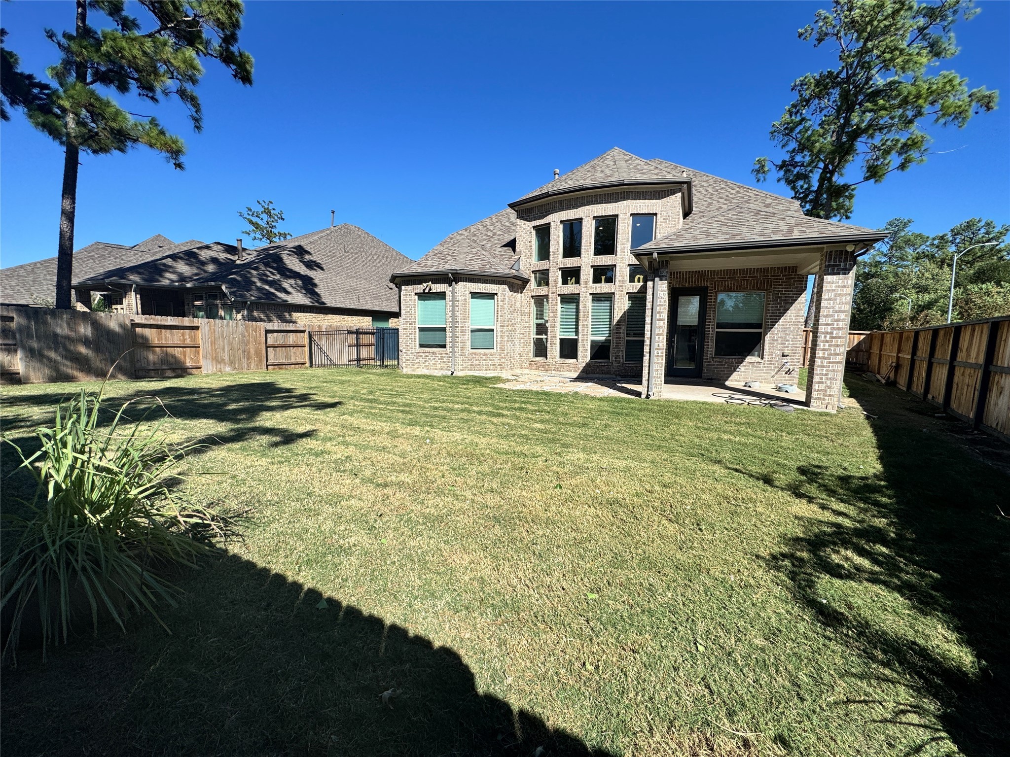 16803 Bark Cabin Drive Humble, TX 77346 - Photo 26 of 27 a front view of a house with a garden