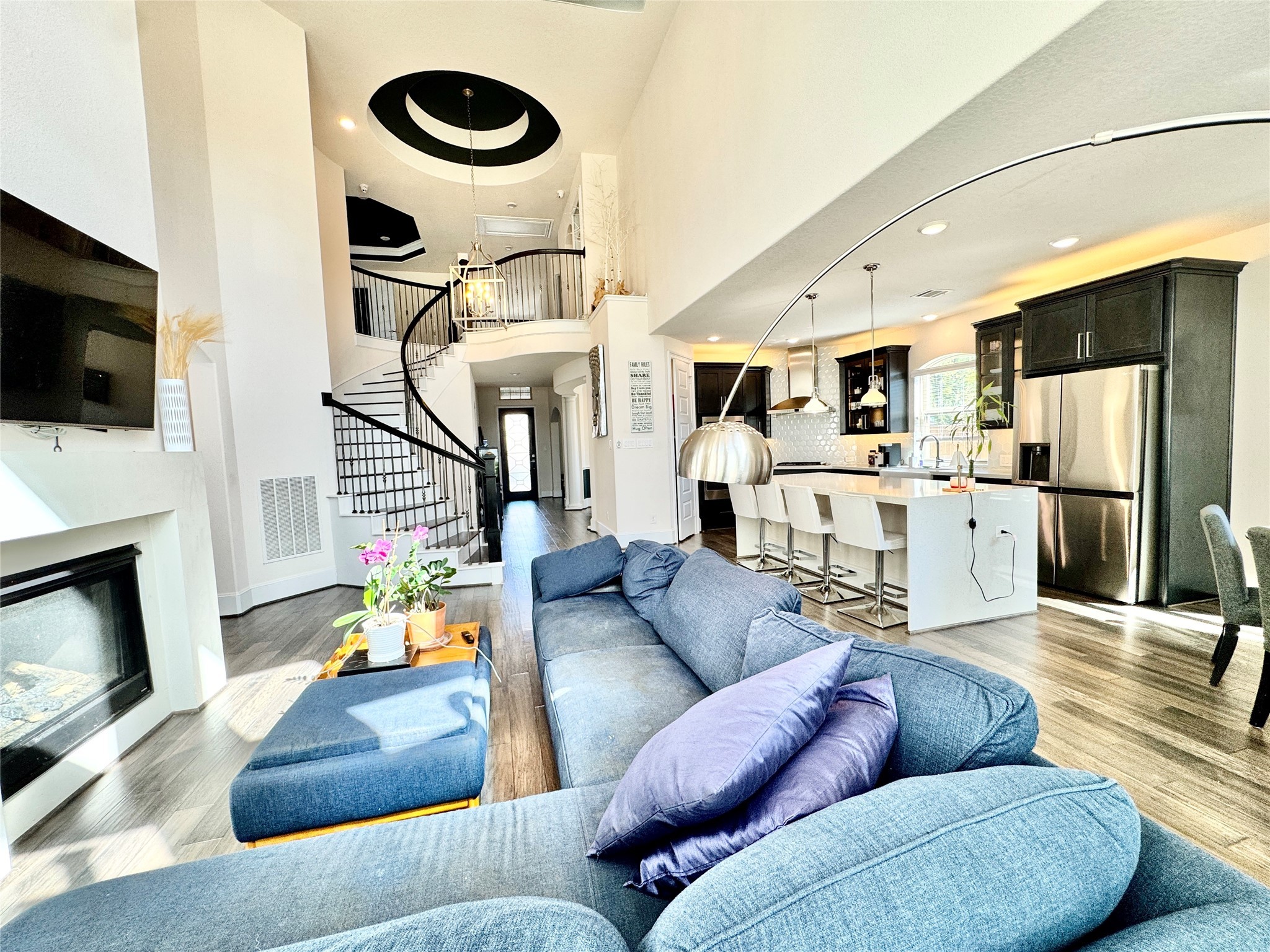 16803 Bark Cabin Drive Humble, TX 77346 - Photo 9 of 27 a living room with furniture and a flat screen tv