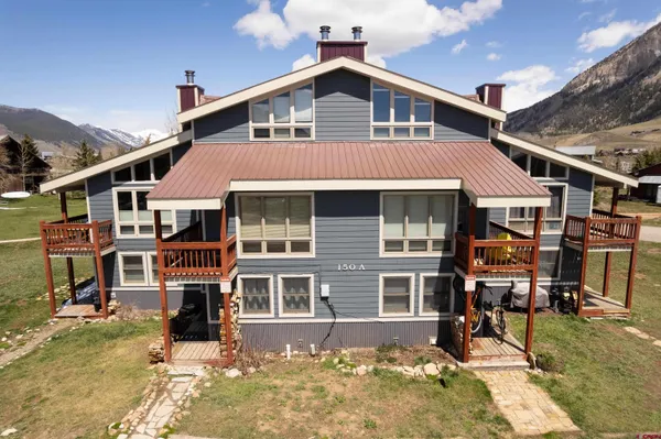 a front view of a house with a patio