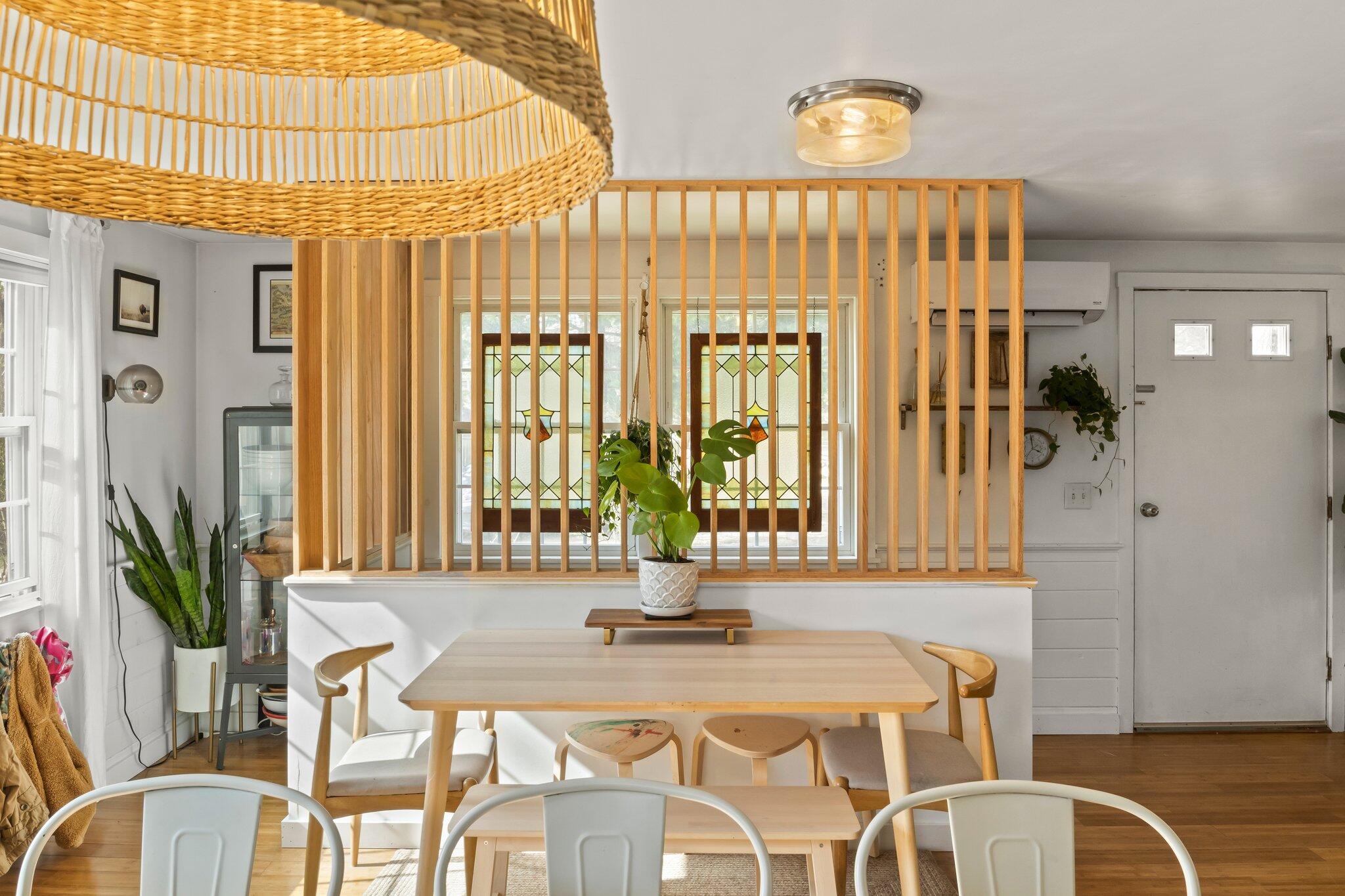 582 Massasoit Road Eastham, MA 02642 - Photo 13 of 45 a dining room with a table and chairs