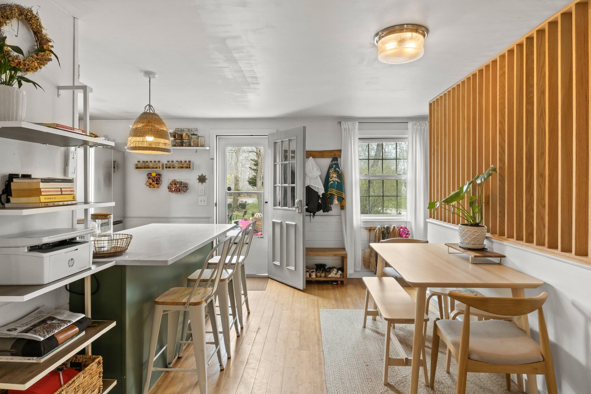 582 Massasoit Road Eastham, MA 02642 - Photo 19 of 45 a view of a dining room with furniture window and outside view
