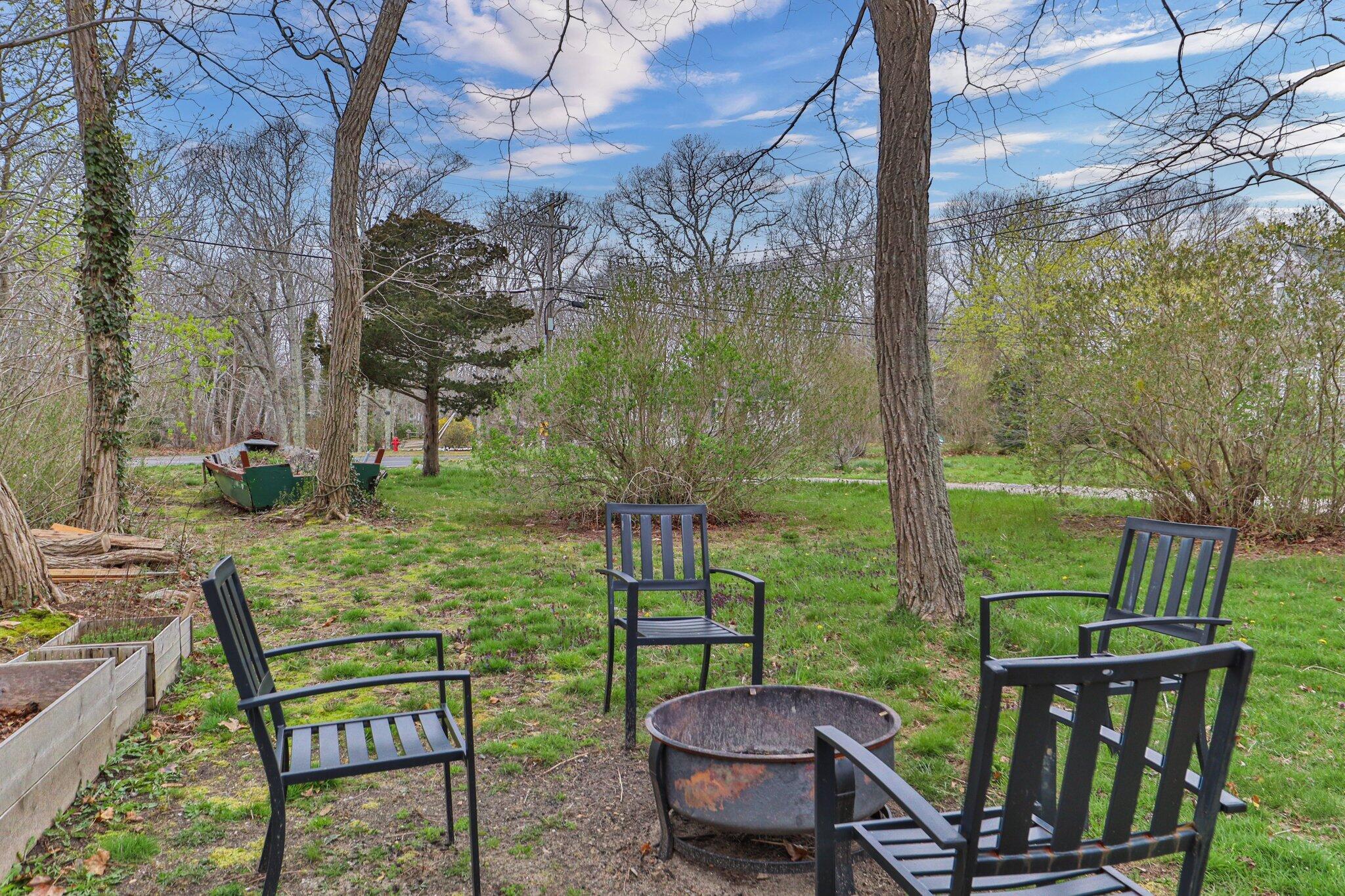 582 Massasoit Road Eastham, MA 02642 - Photo 33 of 45 a view of a two chairs in the deck