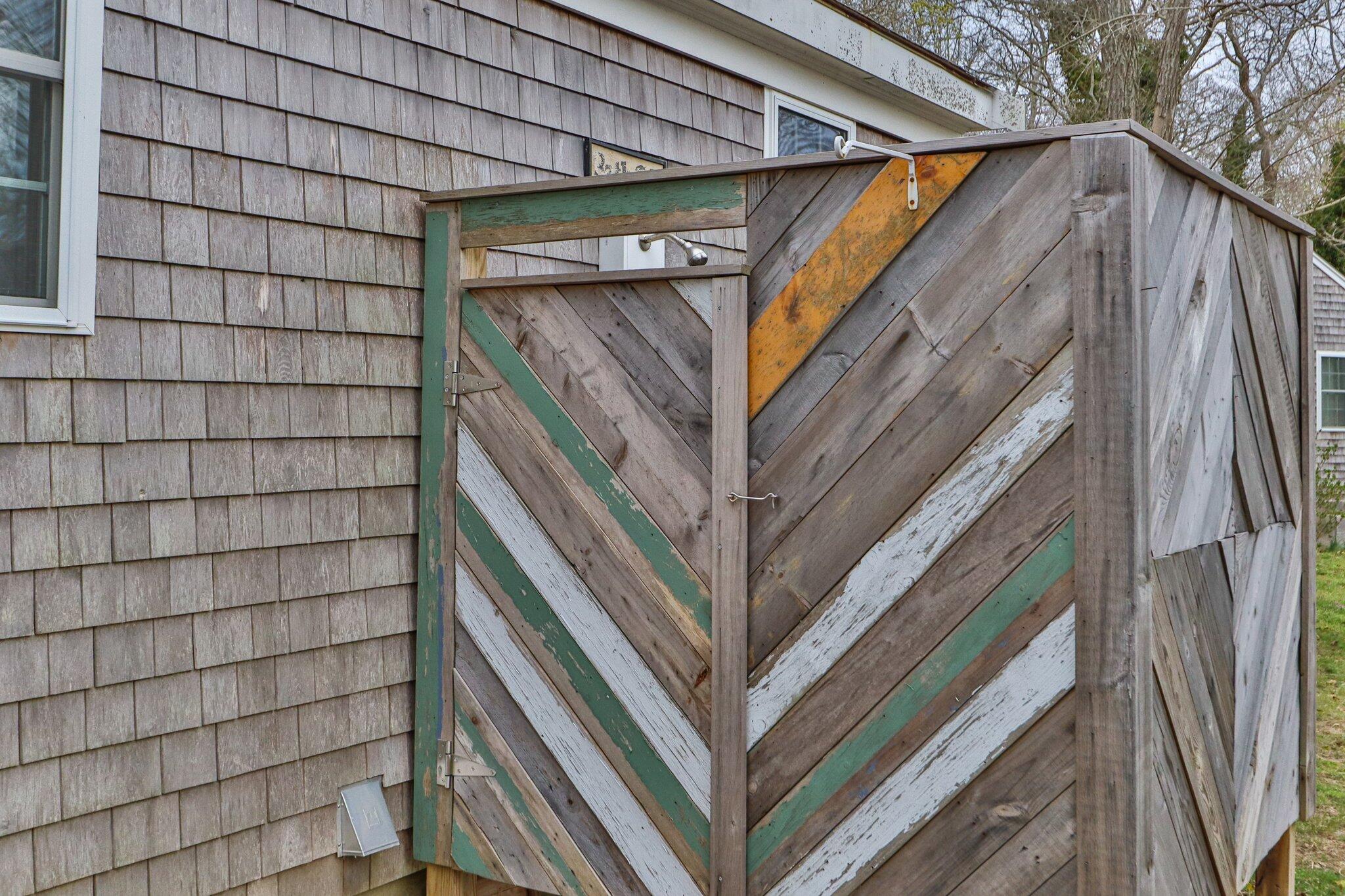 582 Massasoit Road Eastham, MA 02642 - Photo 35 of 45 a house with a trees in front of it