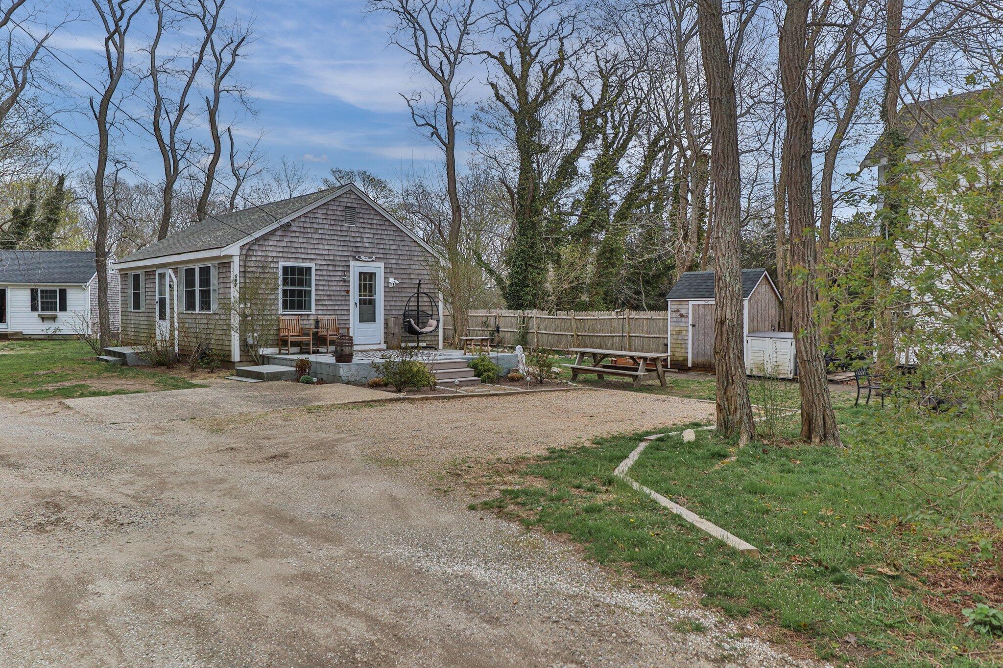582 Massasoit Road Eastham, MA 02642 - Photo 41 of 45 a front view of a house with garden