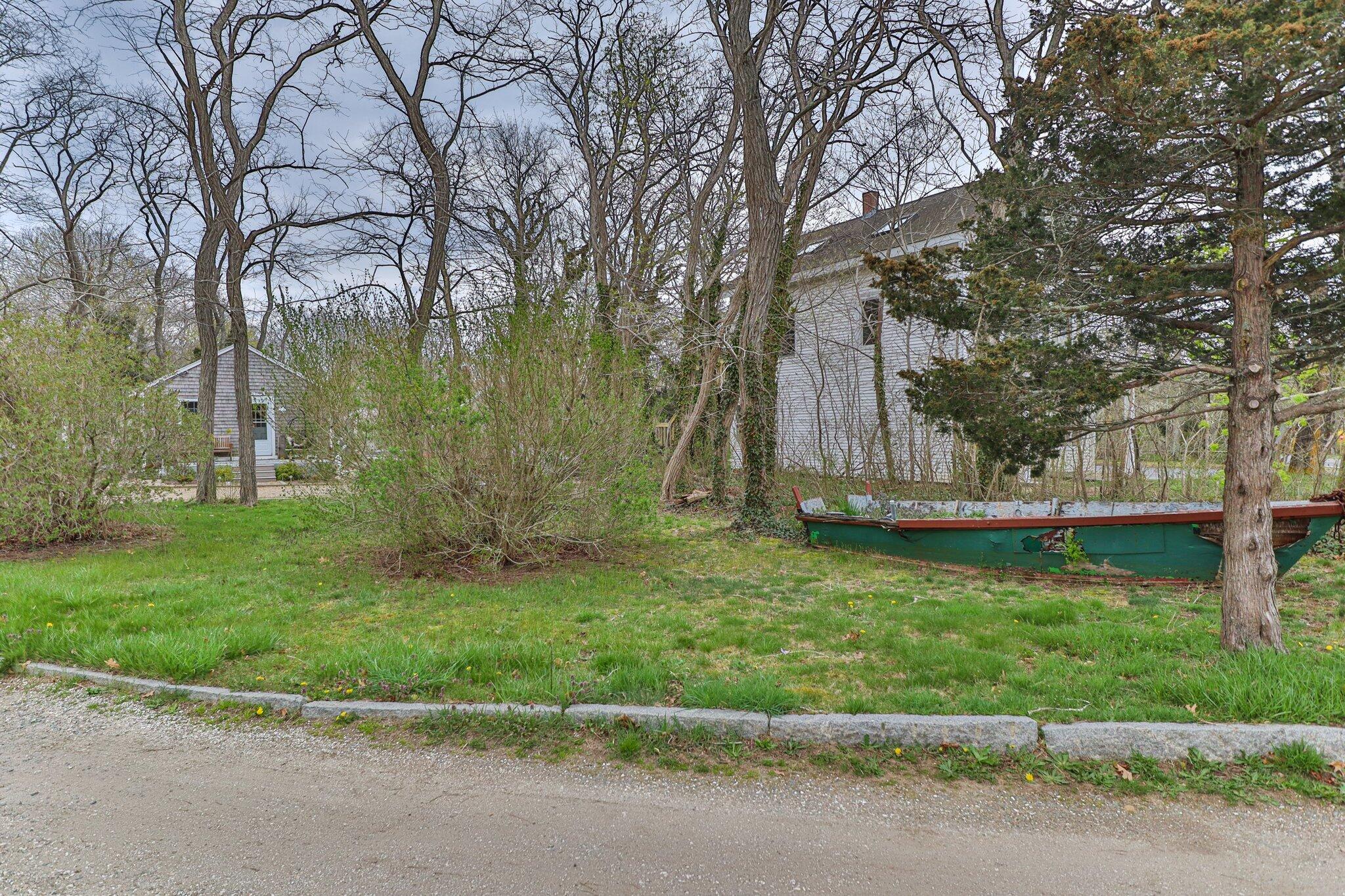 582 Massasoit Road Eastham, MA 02642 - Photo 42 of 45 a view of backyard with tree