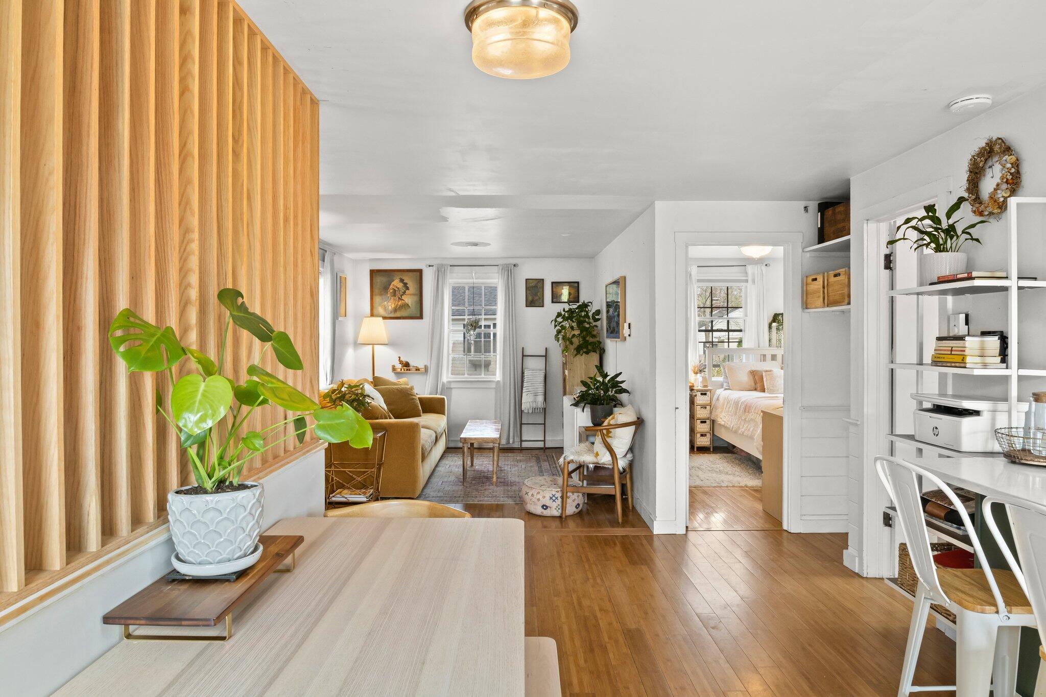 582 Massasoit Road Eastham, MA 02642 - Photo 6 of 45 a living room with furniture and a table