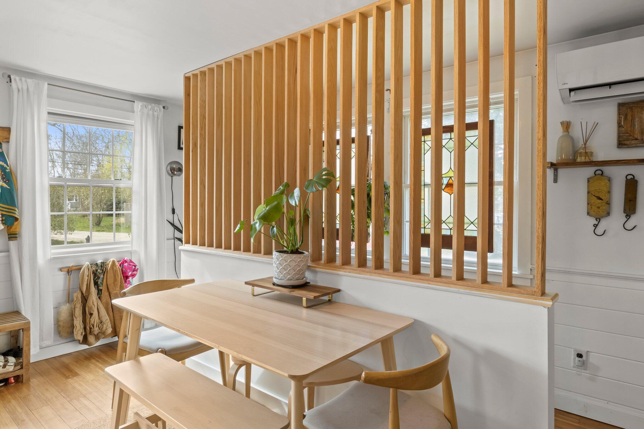 582 Massasoit Road Eastham, MA 02642 - Photo 7 of 45 a view of a dining room with furniture and a window