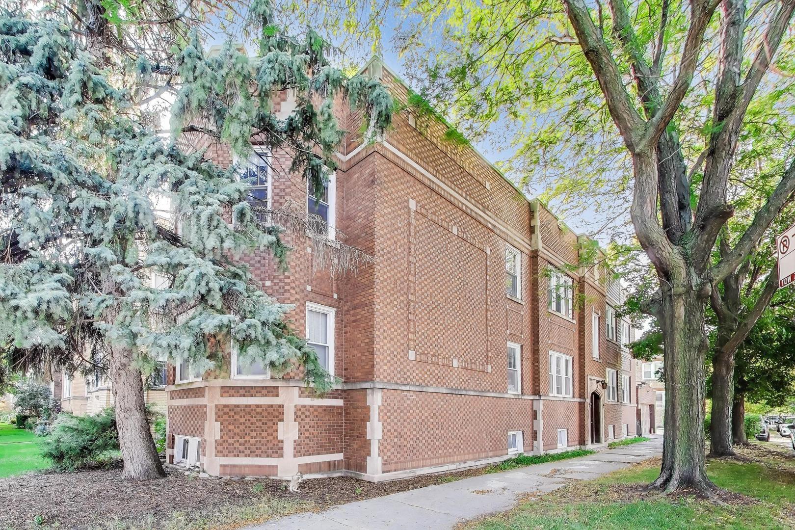 a view of a house with a tree