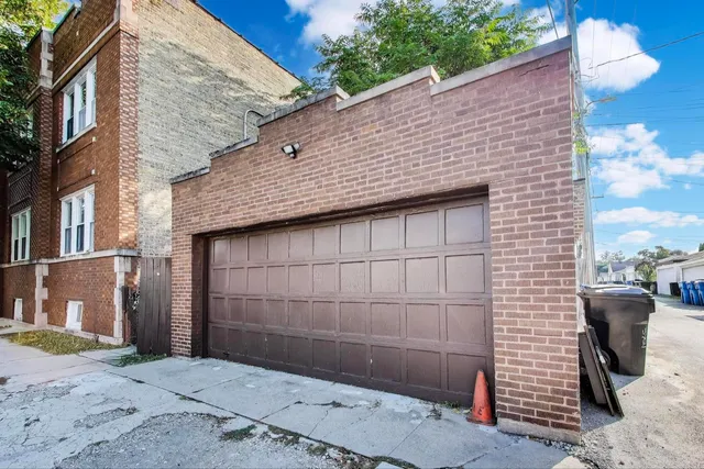 a view of a wooden door of the house