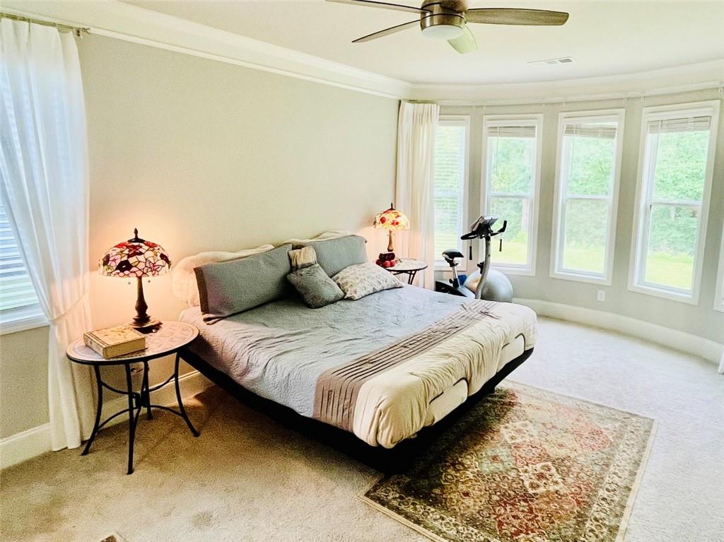 3015 Winding Ridge Waleska, GA 30183 - Photo 14 of 40 a bedroom with a bed and a window
