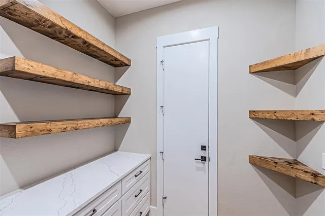 a view of storage and utility room