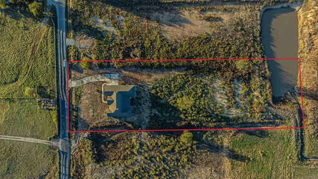 a view of an ocean and city