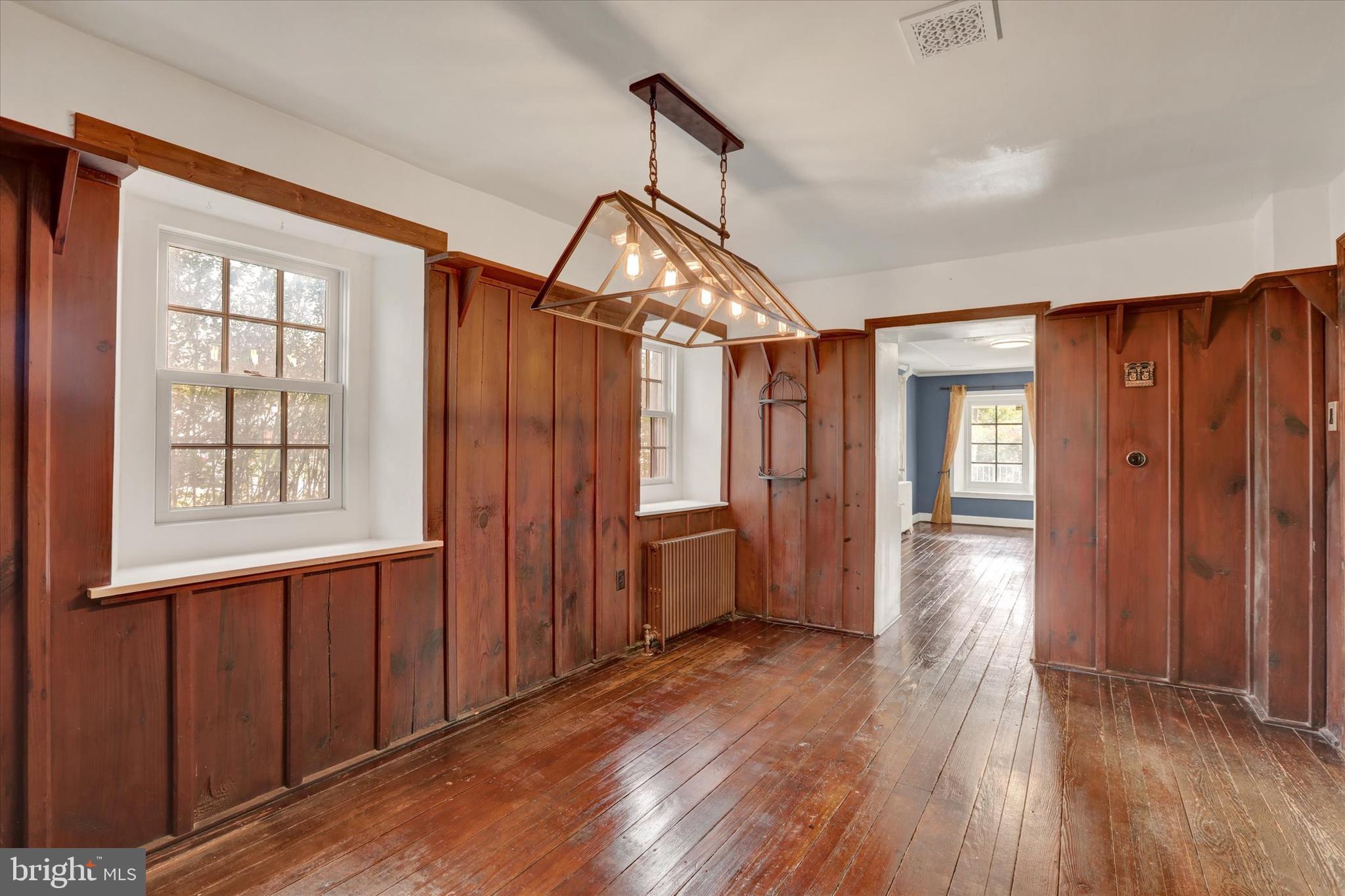 60 Quarry Road Doylestown, PA 18901 - Photo 17 of 70 an empty room with wooden floor cabinet and windows