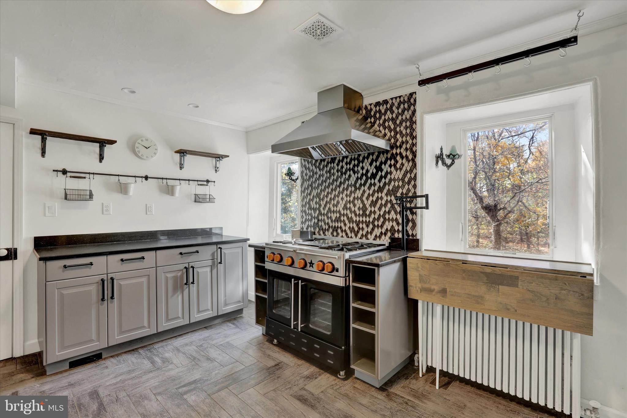 60 Quarry Road Doylestown, PA 18901 - Photo 18 of 70 a kitchen with stainless steel appliances a stove and a refrigerator