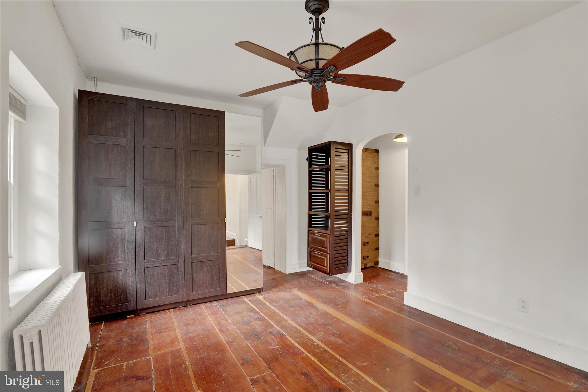60 Quarry Road Doylestown, PA 18901 - Photo 38 of 70 a view of empty room with wooden floor and fan