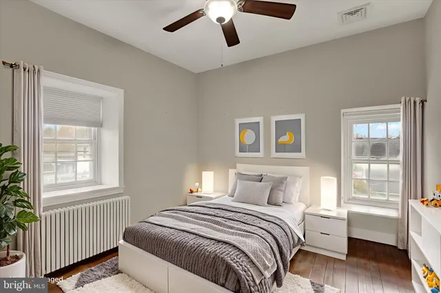a front view of a house with a yard garage and outdoor seating