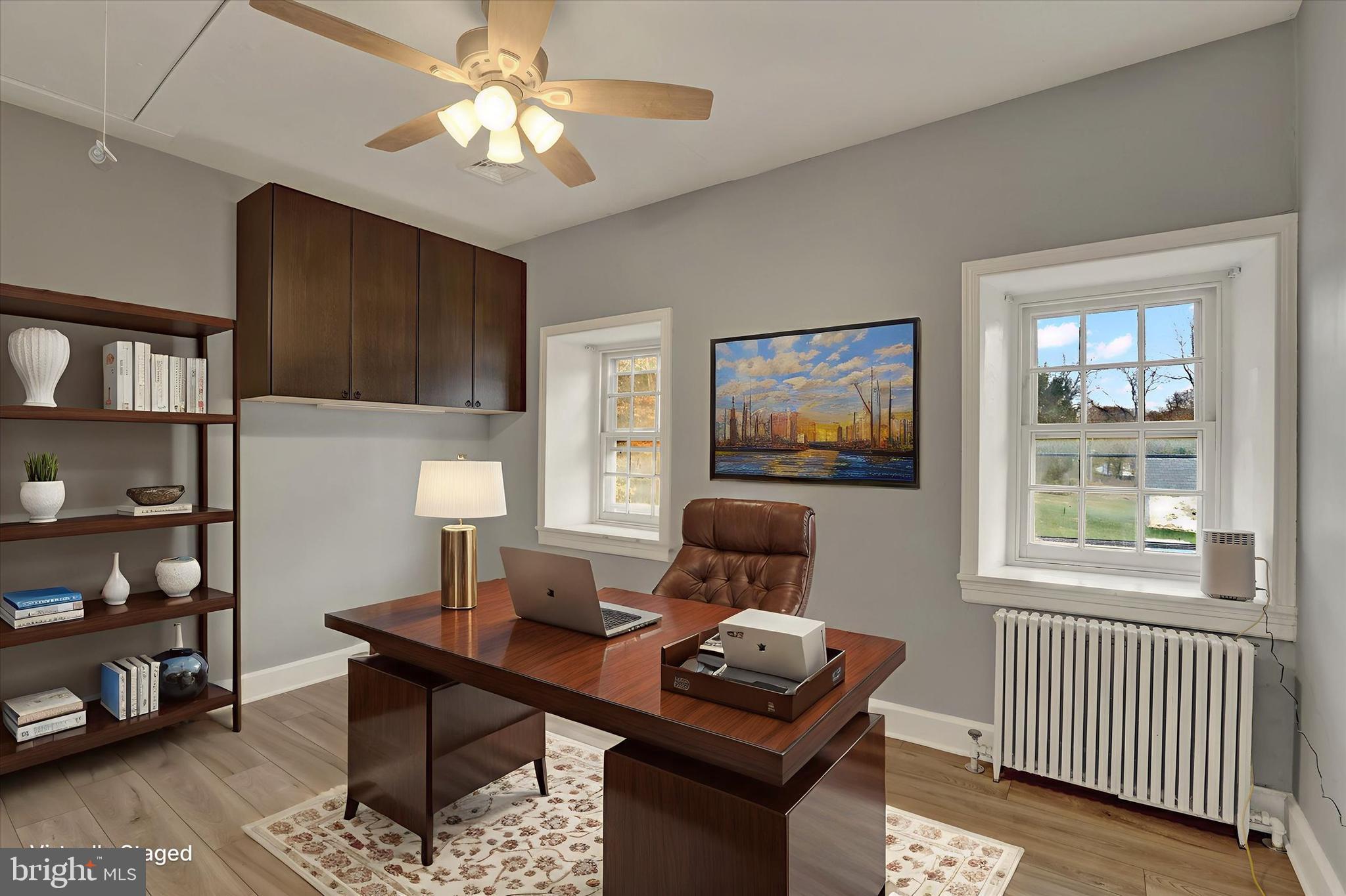 60 Quarry Road Doylestown, PA 18901 - Photo 43 of 70 a living room with furniture a bookshelf and a window