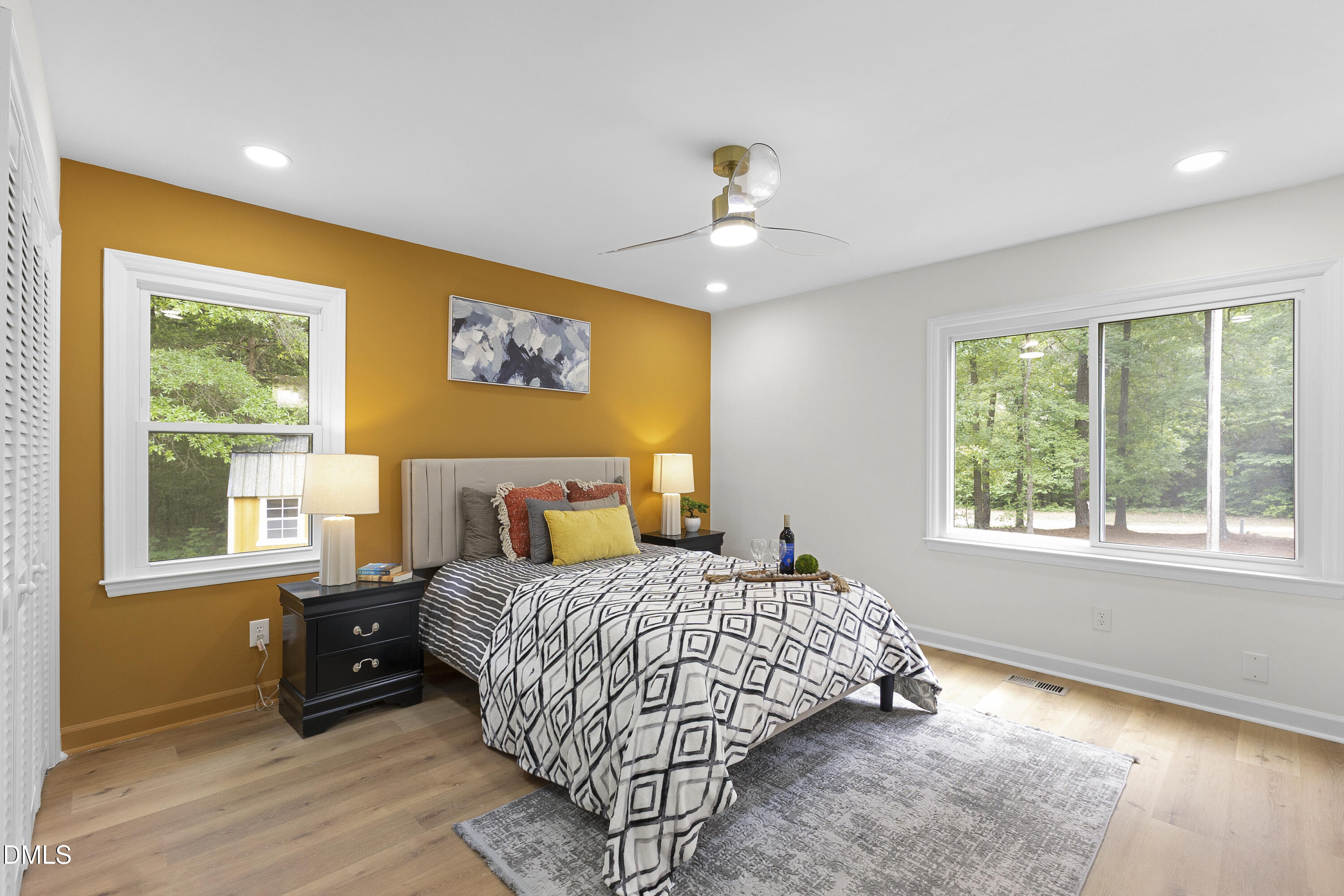 2168 Lakewood Falls Road Goldston, NC 27252 - Photo 15 of 30 a bedroom with a bed and a window
