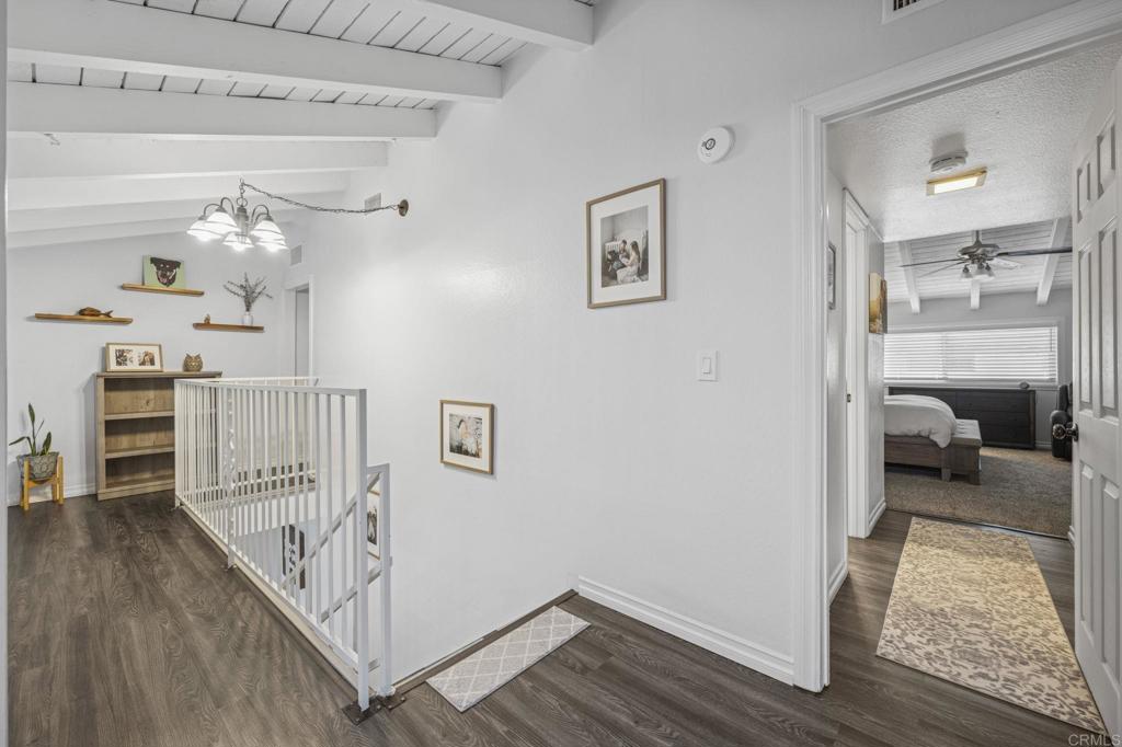 3404 Oak Cliff Drive, Unit 8 Fallbrook, CA 92028 - Photo 19 of 39 a view of a hallway to a livingroom and a wooden floor
